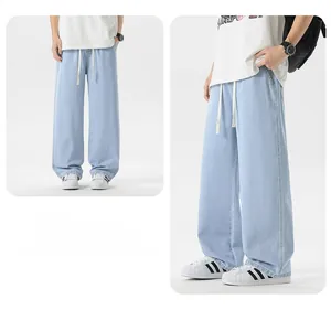 Dettaglio dei jeans a gamba larga celeste con vita elastica e coulisse bianca