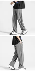 Detailansicht der grauen Herren-Eisseidenhose mit Kordelzug am Bund und weitem Beinverlauf