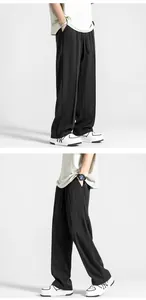 Detailaufnahme der schwarzen Eisseide-Hose mit elastischem Bund und Kordelzug-Design