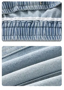 Detail of light blue denim shorts featuring elastic waistband and twill fabric texture
