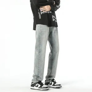 Light blue vintage tapered jeans for men with a relaxed fit and retro washed finish