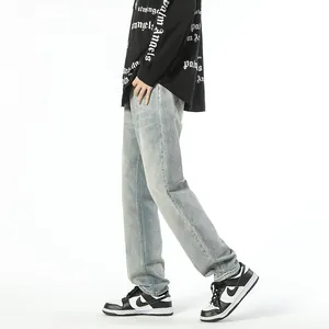 Light blue vintage loose tapered jeans for men with a relaxed fit and retro wash