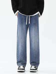 Jean vintage dégradé bleu pour homme à jambe large avec couture frontale et cordon de serrage