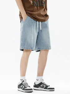 Men's loose gradient light blue denim shorts with drawstring waist and washed finish