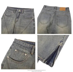 Macro detail of vintage blue denim jeans with side zipper slit and leather logo patch