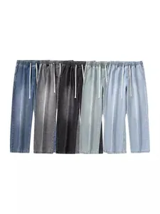 Jean dégradé homme coupe droite large avec cordon de serrage et couture verticale centrale