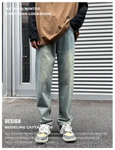 Detail of light blue vintage wash denim pants for men featuring a retro distressed texture