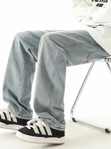 Men's light blue washed straight-leg denim jeans in a loose vintage high street fit