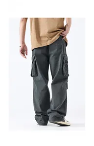 Rear view of charcoal grey multi-pocket cargo pants in loose straight fit cotton