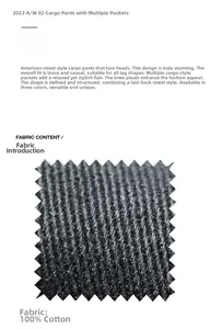 Detailed close-up of dark grey 100% cotton twill fabric for American cargo pants