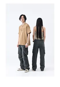 Detail view of American vintage multi-pocket cargo pants on male and female models