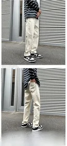 Detailed view of men's cream-white slim straight chinos in American retro street style