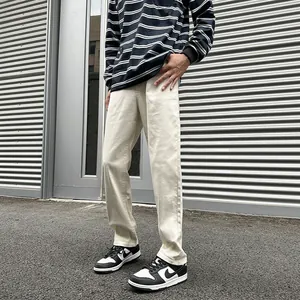 Men's off-white straight leg casual trousers in stretch denim for autumn street style