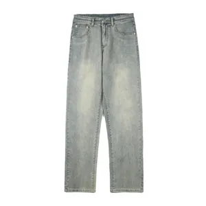 Classic straight leg light blue washed denim jeans for men with vintage whiskering details