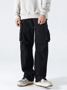 Men's loose straight leg black cargo pants with multiple pockets in street style fashion
