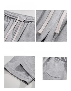Détail du jogging gris avec taille à cordon réglable et poche plaquée à l'arrière