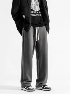 Pantalon de jogging gris ample pour homme avec cordon de serrage blanc et style urbain chic
