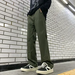 Army green double knee work pants with a loose straight fit for a rugged utility style