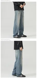Detail view showing American style retro light blue washed distressed wide-leg denim jeans