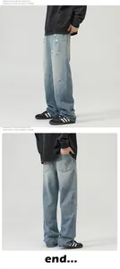Detail view of American streetstyle baggy jeans with heavy washing and distressed knee holes