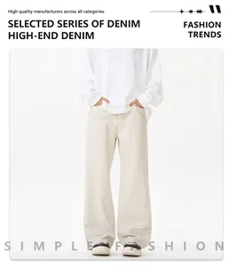 Macro shot of high-end off-white heavy denim wide-leg pants with clean fit straight cut