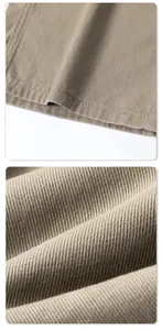 Close-up of premium khaki twill fabric texture and durable reinforced stitching detail