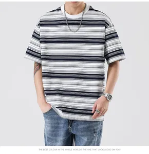 Detail of classic black and white striped cotton fabric on men's casual crew neck t-shirt