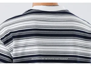 Close-up of the back print on a blue and white striped cotton t-shirt with crew neck