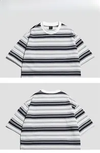 Flat lay macro view of the crew neck and striped fabric detail on the retro t-shirt