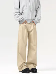 Men's minimalist beige wide-leg trousers in a loose straight fit with front pleats