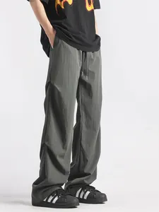 Men's loose straight-leg parachute cargo pants in grey quick-dry fabric with drawstring