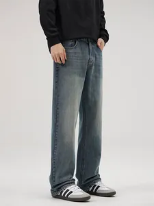 Men's retro loose straight-leg denim jeans with vintage wash and distressed details