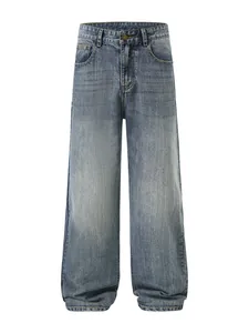 Vintage heavy wash blue straight-leg jeans with wide fit and retro faded texture