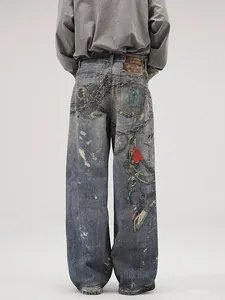 Men's baggy wide-leg jeans with vintage wash, ink splatter and graphic digital prints