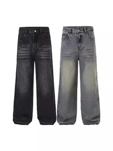 Jean large pour homme en noir et gris vintage avec ourlet à bords bruts usés