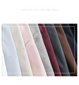 Detailed fabric texture display of heavyweight cotton sweatshirts in various colors