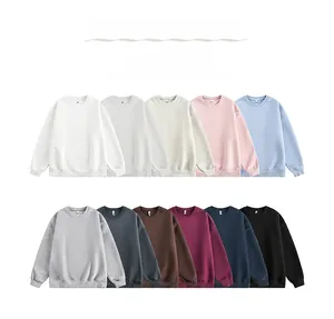 Flat lay display of unisex heavy cotton sweatshirts in 11 different pastel and neutral colors