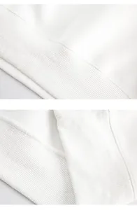 Detail of white 405g heavy sweatshirt showing ribbed cuff texture and clean inner stitching