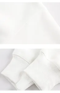 Detailed view of elastic ribbed cuffs and seamless stitching on a heavy cotton sweatshirt