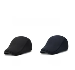 Winter wool newsboy caps in black and navy blue shown on a clean white background