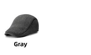 Macro detail of the grey wool blend fabric texture on this vintage style flat cap for men