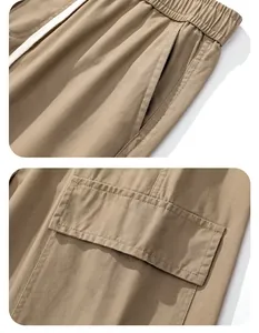 Détails du pantalon cargo kaki avec taille élastique à cordon et poches latérales