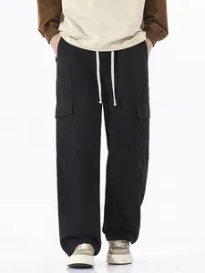 Pantalon cargo rétro noir pour hommes avec poches multiples et cordon de serrage blanc