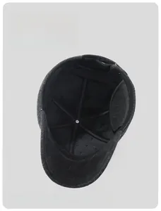 Close-up of the thick black fleece lining and ear protection inside the wool baseball cap