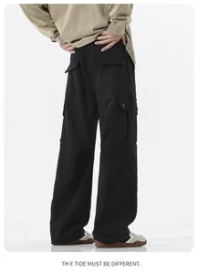 Rear view of black waterproof cargo pants with large side pockets and relaxed fit design