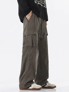 Men's dark gray outdoor waterproof cargo pants with side pockets and a relaxed straight fit