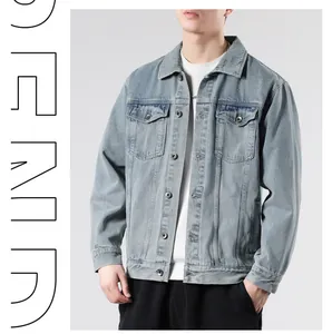 Close-up of light blue denim jacket with vintage wash and dual chest flap pockets