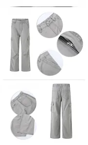 Detail view of grey vintage cargo pants showing multi-pocket design and straight leg fit