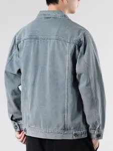 Back view of men's vintage washed light blue denim jacket with classic seams and metal buckles
