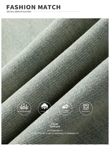 Macro detail of grey denim fabric showing breathable, soft, and non-iron twill texture